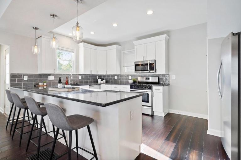 Bright kitchen with white cabinets